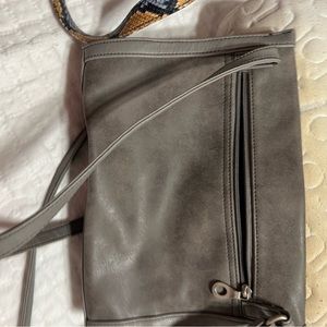 Relic pouch purse with side openings.  Grey shoulder bag. Like new